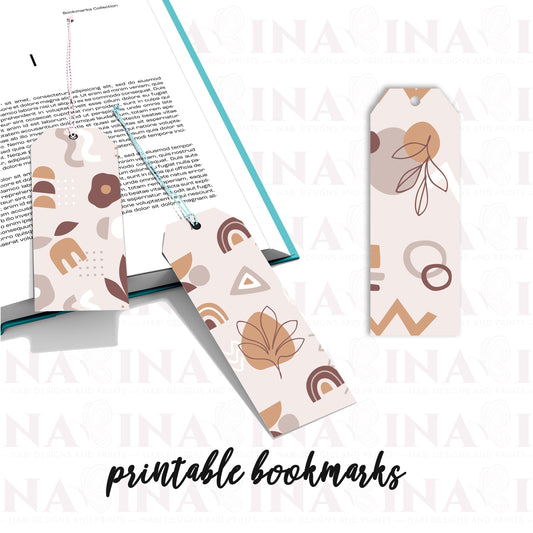 Three printable bookmarks with geometric patterns on a book.